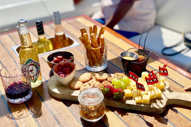 Amsterdam Small-Group Canal Cruise Including Snacks and Drinks - Maritime Museum, Hortus Botanicus, and the eastern canals