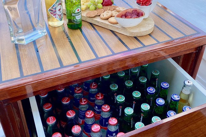Amsterdam Small-Group Canal Cruise Including Snacks and Drinks - Practical details, weather, and cancellation