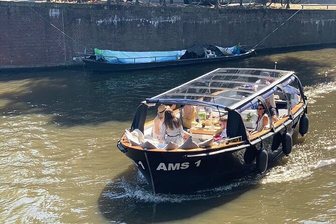 Amsterdam Small-Group Canal Cruise Including Snacks and Drinks - Bitterballen, stroopwafels, and the open bar