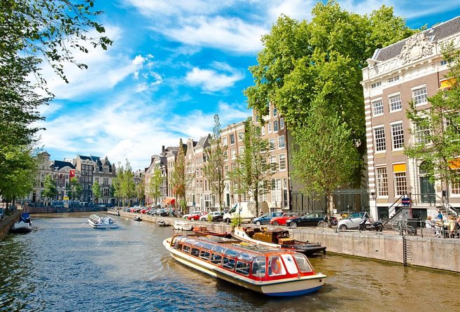 Amsterdam Small-Group Canal Cruise With Dutch Snacks and Drink - Why the small boat changes the canal experience