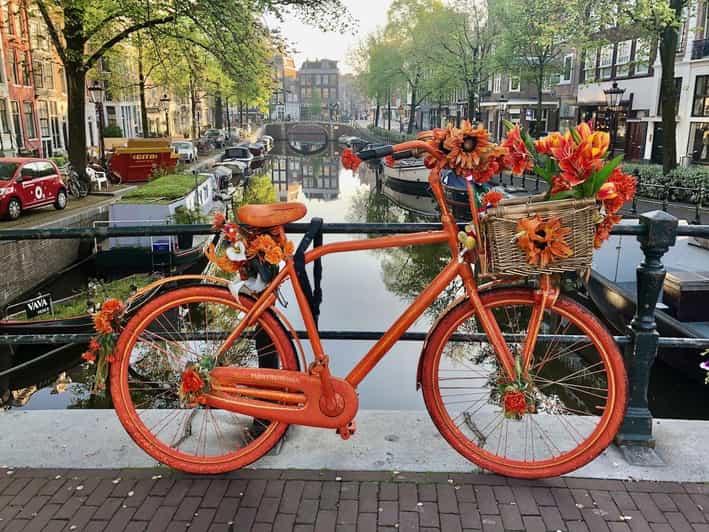 Amsterdam: Small Group Walking Tour with Fun Guide - Begin at the National Monument on Dam Square