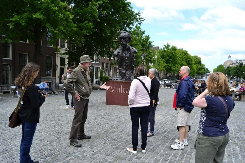 Amsterdam: The Story of History & Culture Walking Tour - Start at Beursplein, between Dam Square and Central Station
