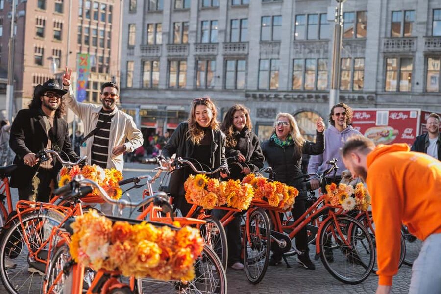 Amsterdam: Top Highlights Guided Bike Tour EN/DE/ES/FR/IT/CN - Canals, Nine Streets, and Dam Square