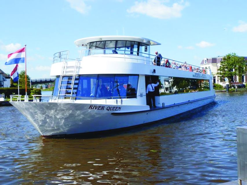 Amsterdam: Tour to Keukenhof Gardens with Windmill Cruise - Finding This is Holland behind Central Station