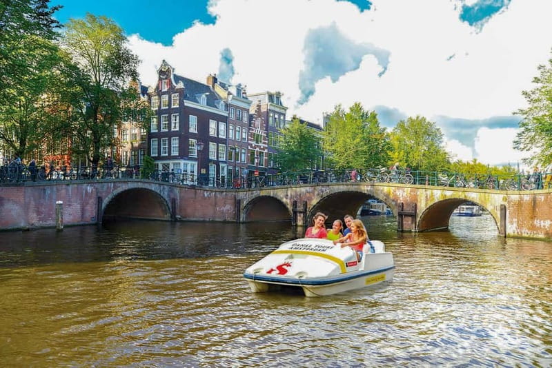 Amsterdam: Unique Pedal Boat Experience in the Canals - Pedaling past Amsterdam’s major sights
