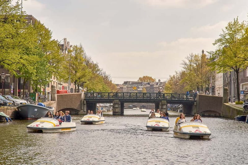 Amsterdam: Unique Pedal Boat Experience in the Canals - Sharing a boat with family or friends