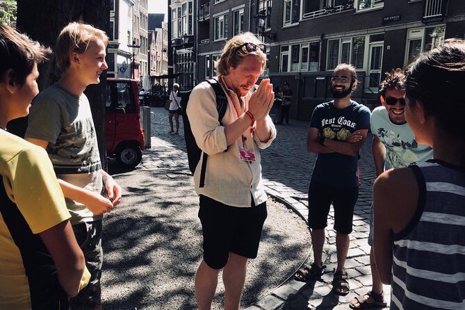 Amsterdam Walking Tour with a local comedian as guide - Grimburgwal and the meaning behind Dutch birthday wishes