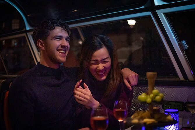 Amsterdam Wine and Cheese Guided Evening Cruise - Commentary, music, and the mood onboard