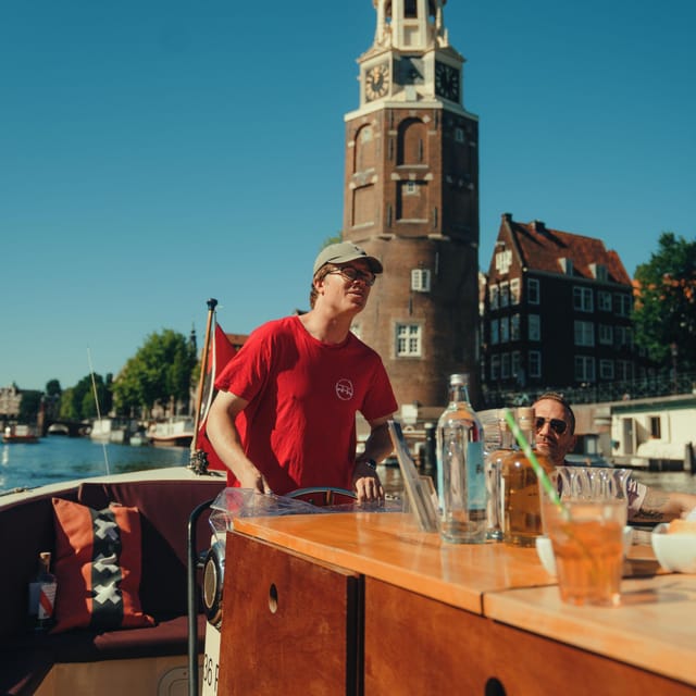 COZY AND FUN CANAL TOUR: A UNIQUE JOURNEY THROUGH AMSTERDAM - Burgwallen Oude Zijde and the Oude Kerk