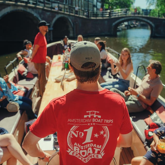 COZY AND FUN CANAL TOUR: A UNIQUE JOURNEY THROUGH AMSTERDAM - Stopera, Herengracht, and Amsterdam’s grander canals