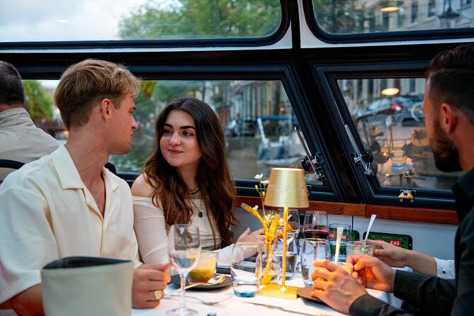 Dinner Canal Cruise Amsterdam: 4-Courses Including Drinks - Magere Brug and the Amstel after sunset