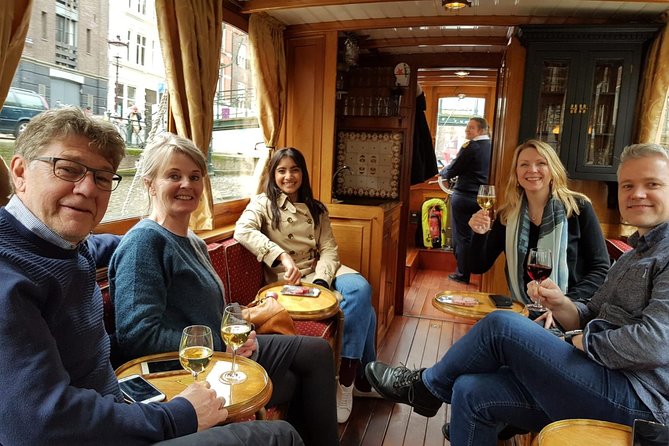 Eating Amsterdam: Food Tour & Canals Cruise - Poffertjes, wartime context, and the walk between stops