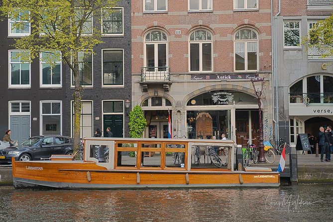 Exclusive Cruise! 90 min - 12 guests max - Book Leemstar! - A warm boat with drinks and Dutch bites
