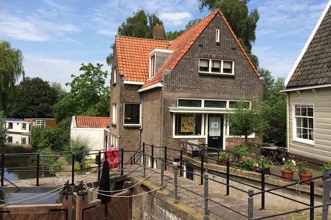 Full-Day Private Guided Countryside Tour from Amsterdam by Bike - Nieuwendammerdijk and Amsterdam’s wooden houses