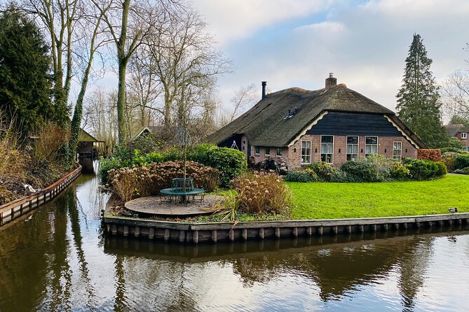 Giethoorn, Afsluitdijk, Zaanse Schans Day Tour Incl Hotel Pick Up - Hotel pickup, timing, and the real cost