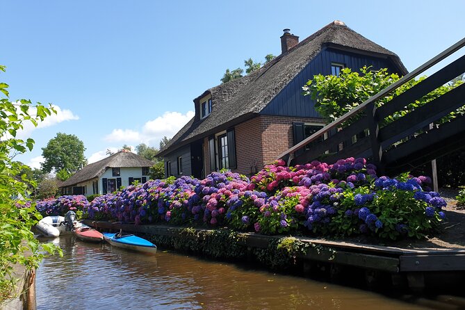 Giethoorn, Zaandam & Zaanse Schans Day Tour w/ Small Boat Ride - Zaanse Schans, windmills and a crowded postcard