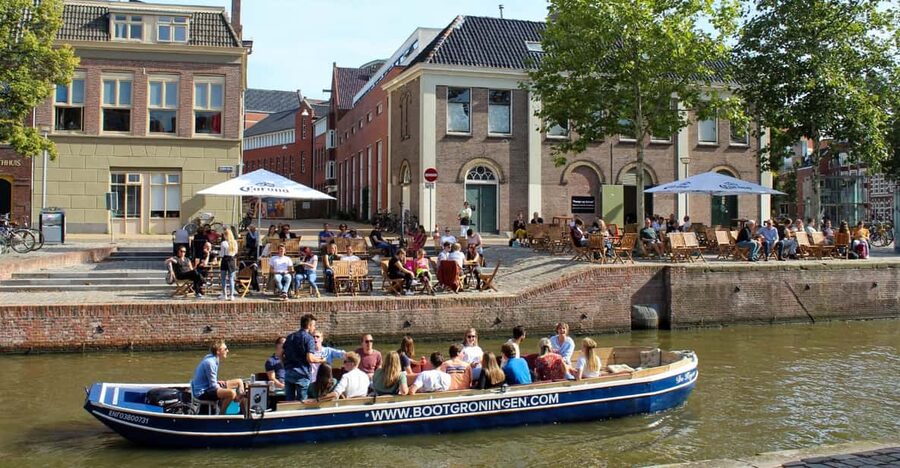 Groningen: Open Boat City Canal Cruise - Stadsschouwburg, the Martinitoren, and low bridges