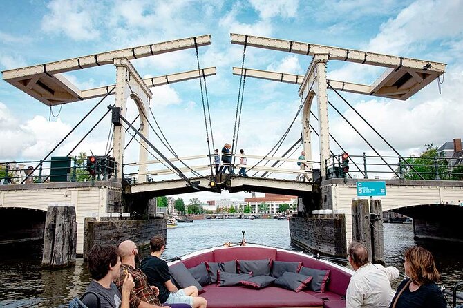 Guided Amsterdam Canal Cruise – Snacks & Drinks on board(1 Hour) - Jewish heritage and the city’s painful chapters
