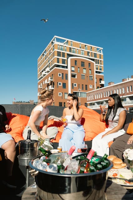 Haarlem Private Canal Tour with Bites and Unlimited Drinks - Settling into the cozy private boat