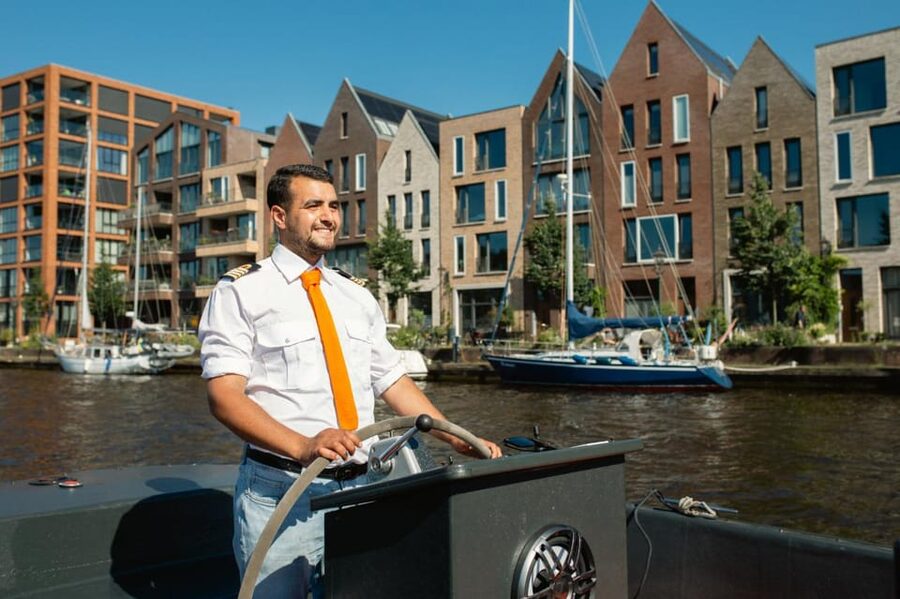 Haarlem: Sightseeing Boat Tour with Snacks and Drinks - Snacks, cheese, and drinks on board