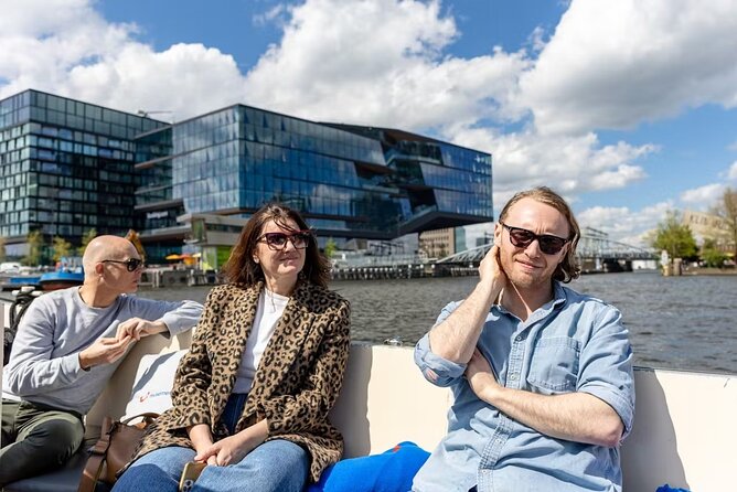 Highlights and Local Insights Canal Cruise Tour in Amsterdam - The Red Light District, Oude Kerk, and Amsterdam’s oldest canal