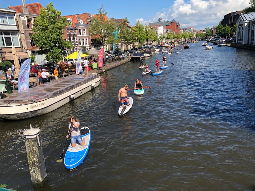Leiden: Paddleboard Rental to Explore Leiden's Canals - Windmills and courtyards beside the canals