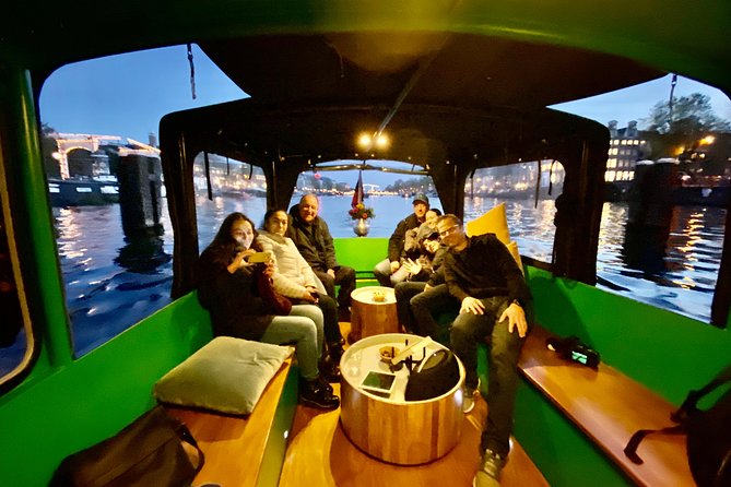 Light Event Amsterdam by small boat, 8 passengers max! You won't find any better - Boarding the Zavi, a cozy boat with useful comforts