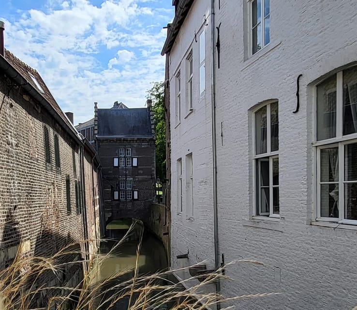 Maastricht Hidden Gems Tour Uncover the Unexpected - Walk beside Helpoort and the Jeker city wall