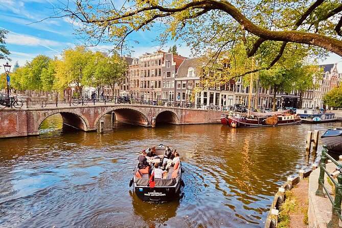 Private 90 Minute Amsterdam Canal Belt Exploration Cruise - From the Amstel to the Dancing Houses