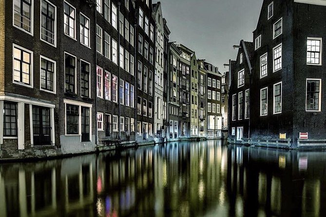 Private Amsterdam Bike Tour with a local guide (also for families) - Dam Square and Damstraat mark the old center