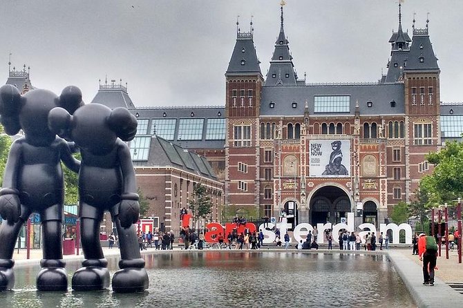 Private Amsterdam City Highlights Bike Tour (PRIVATE GUIDE) - The first streets: learning to ride like a local