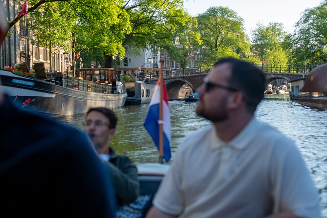 Private Boat Tour Amsterdam - 90 Min incl. welcome drink on historic saloon boat - Meeting at Oosterdokskade 8