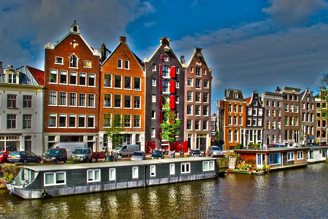 Private departure transfer from Amsterdam to Schiphol Airport (AMS) - From your Amsterdam address to the airport door