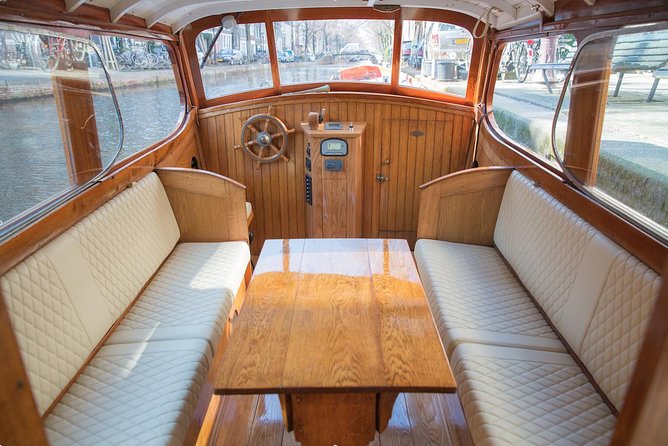 Private Guided Historic Amsterdam Canal Cruise in a Salon Boat - The Anne Frank House from the water