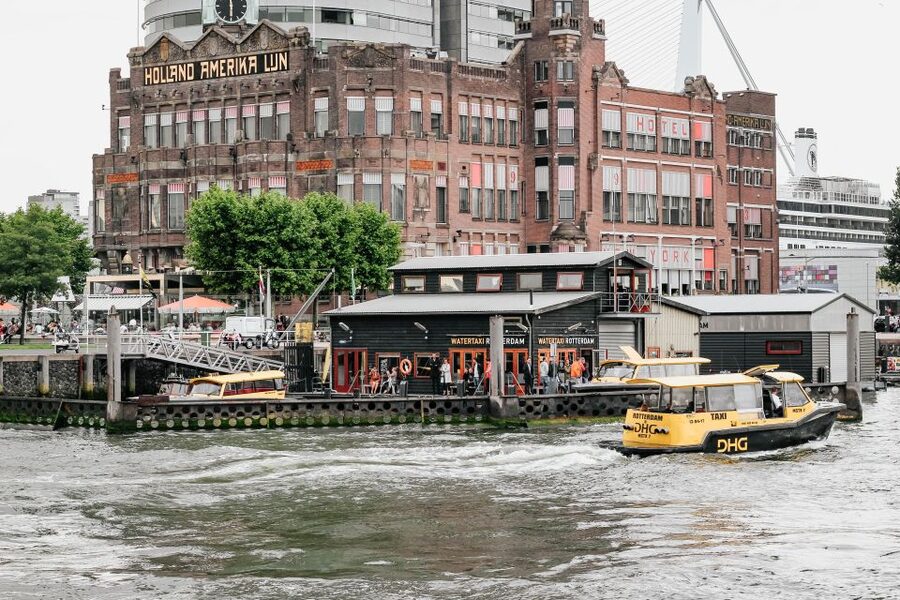 Rotterdam Architecture: Centre and South Bank with watertaxi - St. Laurens Church and a surviving piece of old Rotterdam