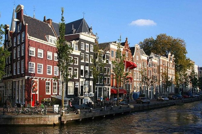 Secrets of Amsterdam Walking Tour plus Dutch Sweets Tasting - Bloemenmarkt and the floating flower market