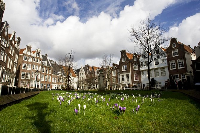 Secrets of Amsterdam Walking Tour plus Dutch Sweets Tasting - Nieuwmarkt, De Waag, and Rembrandt