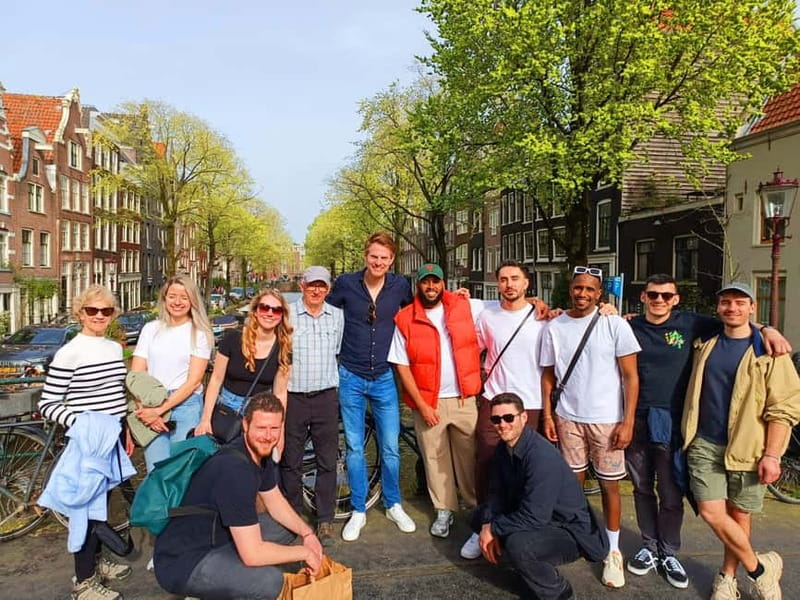 Skipping Lines & Sipping Beers: A History Tour of Amsterdam - Walking the canals and lesser-seen streets
