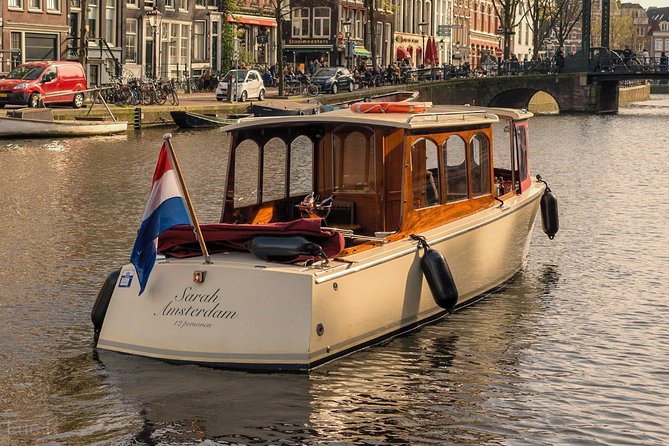 Small-Group Luxury Canal Cruise with Local Skipper - Anne Frank House from the canal
