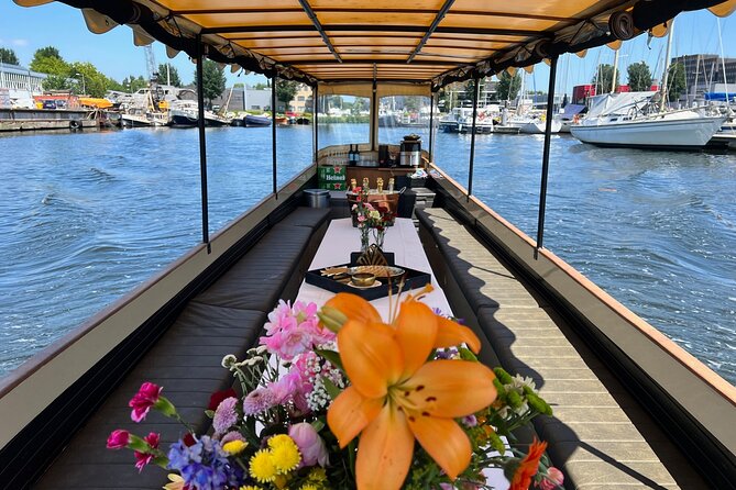 Small-Group Luxury Canal Cruise with Local Skipper - Crooked houses near the Amstel