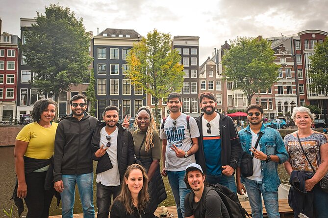 Small Group Walking Tour - Hello Amsterdam - Dam Square and Damstraat set the city’s stage