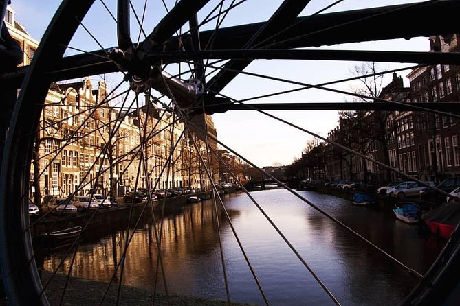Urban Adventures Amsterdam Bike Tour, Graffiti and Magnet Fishing - The Jordaan by bicycle