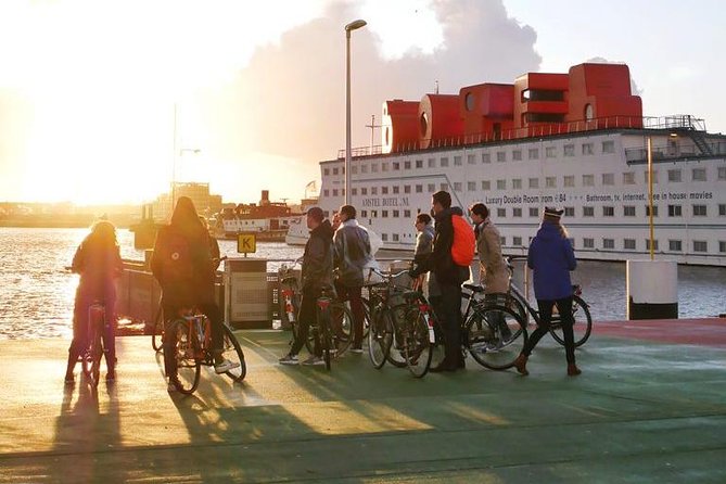 Urban Adventures Amsterdam Bike Tour, Graffiti and Magnet Fishing - Ferrying across to Amsterdam Noord