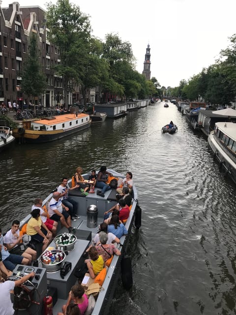 Visit Amsterdam by Boat with a French Guide (french) - Small canals and the Jordaan