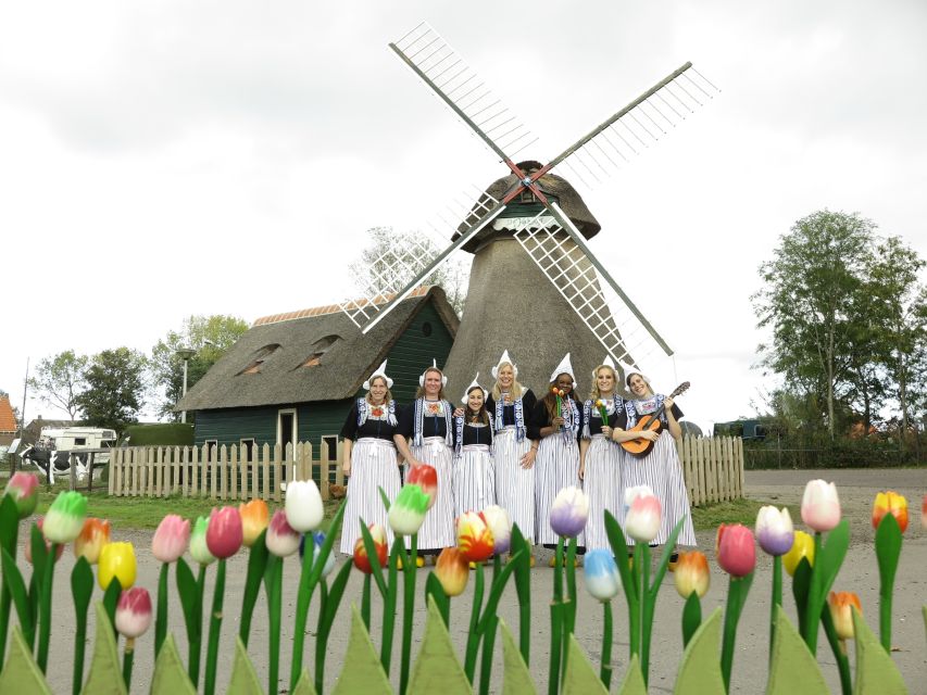 Volendam: Traditional Costume Photo with Cheese & Clog Tour - Seeing a clog take shape