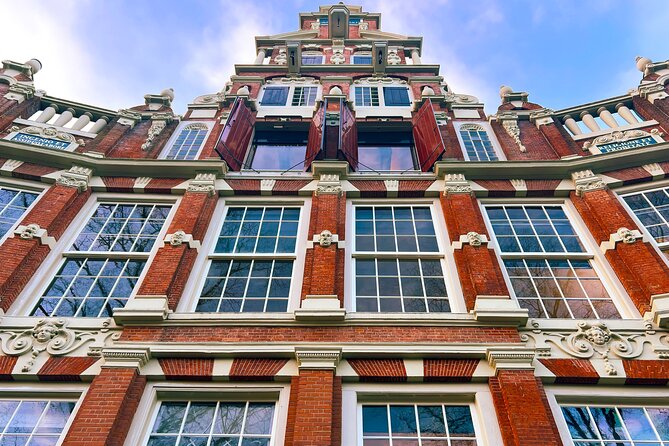 Walking Tour about Golden Age Architecture, private local guide - Jordaan: small façade stones with large stories