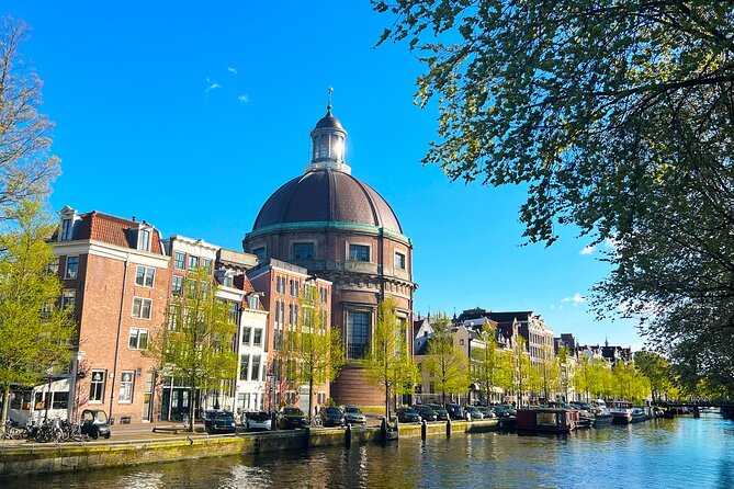 Walking Tour about Golden Age Architecture, private local guide - Dam Square and the Royal Palace: power on difficult ground