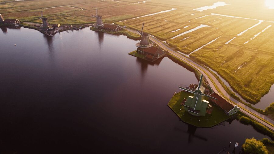 Zaanse Schans: Cruise UNESCO Windmills Village + Live Guide - Oil, paint, wood, and flour along the Zaan