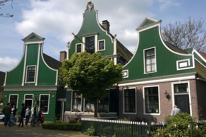 Zaanse Schans Windmills, Clogs and Dutch Cheese Small-Group Tour from Amsterdam - Watching clogs take shape at the wooden shoe workshop